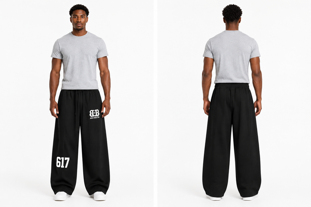 Front and back views of a fit Black male model wearing the black Bred in Boston wide-leg sweatpants